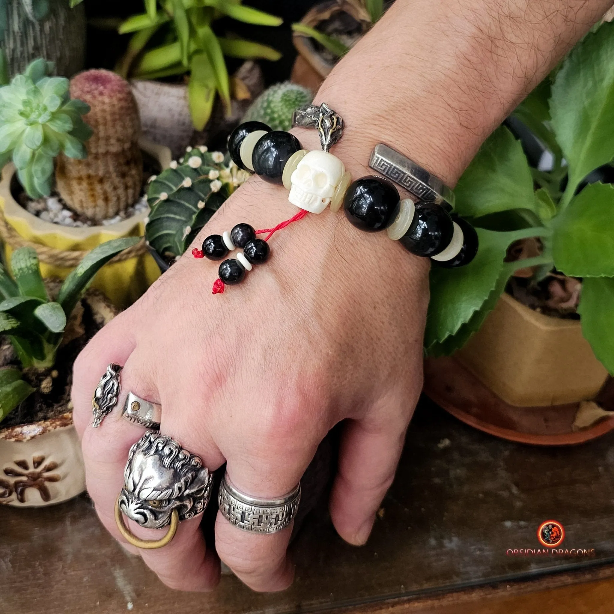 Bracelet en obsidienne oeil céleste artisanal- crâne sculpté